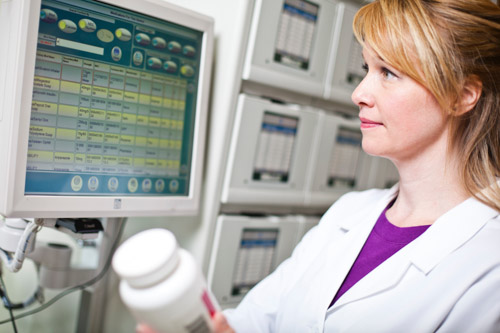 Pharmacist verifies drugs for ATP 2